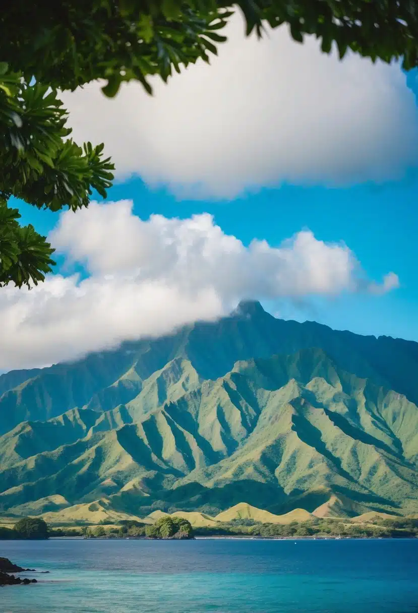 Lush green mountains and blue ocean at Kualoa Ranch, Oahu, Hawaii